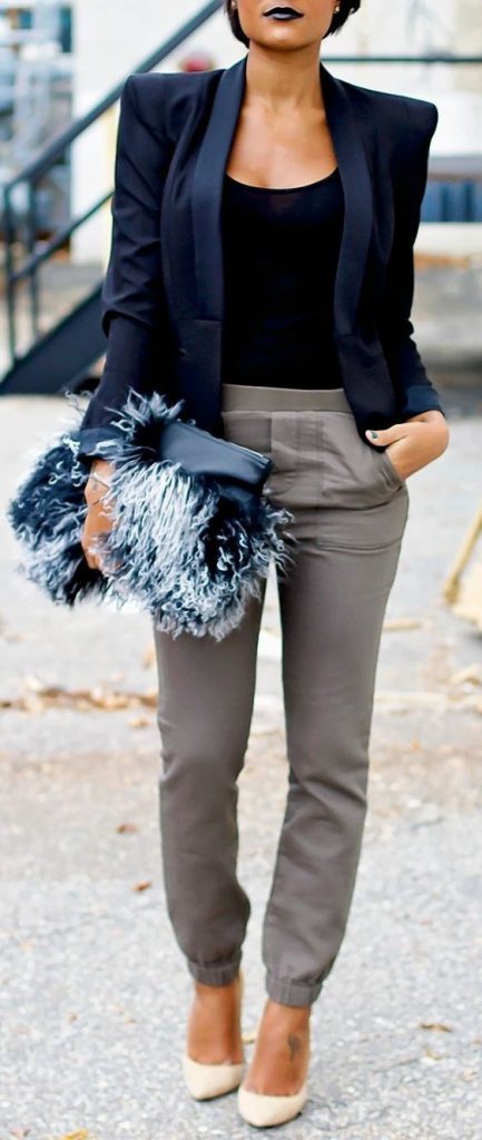 15-grey-trousers-a-black-top-a-navy-shoulderpad-jacket-and-a-fluffy-clutch